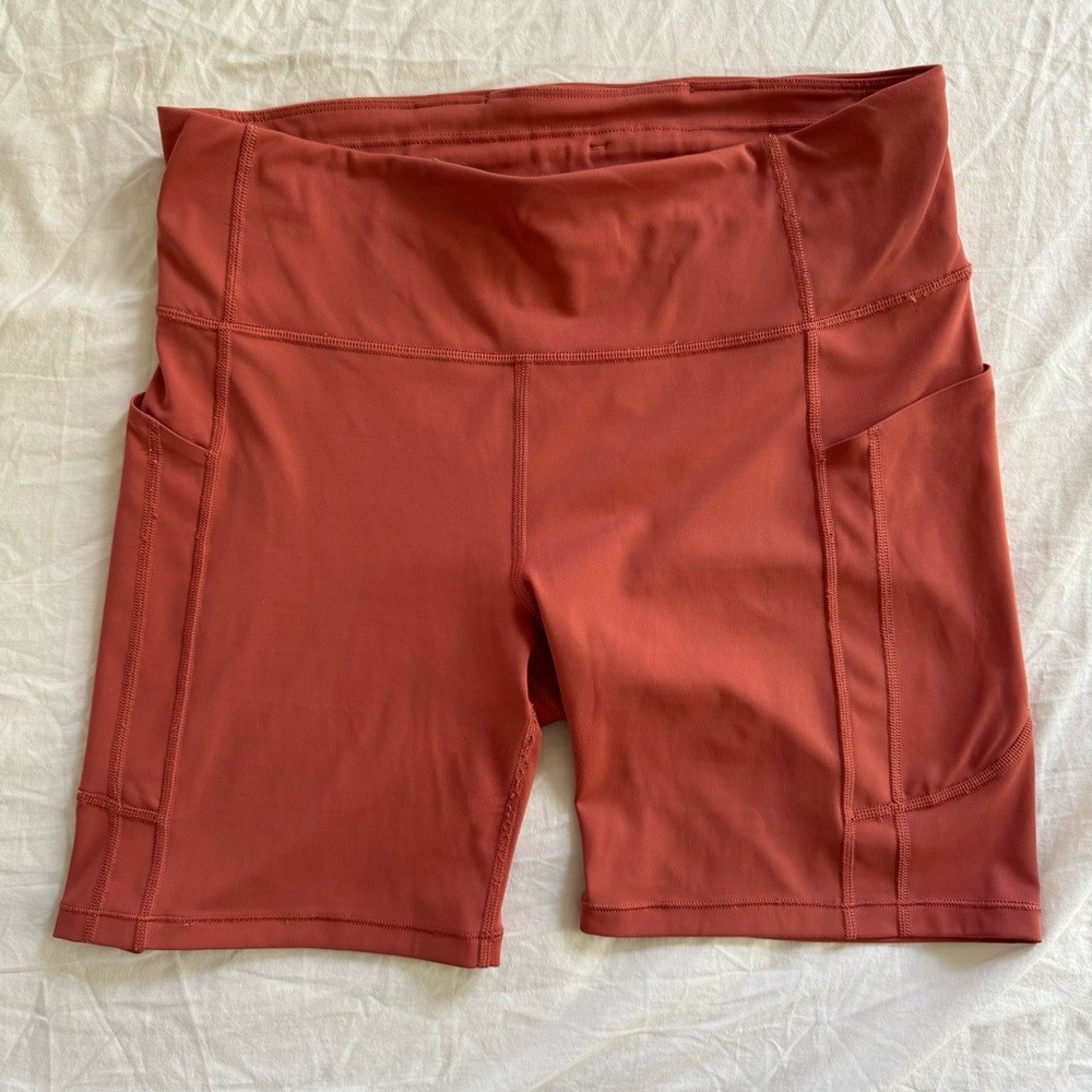 Athleta Ultimate Stash II 7" Short • L • Muted Red